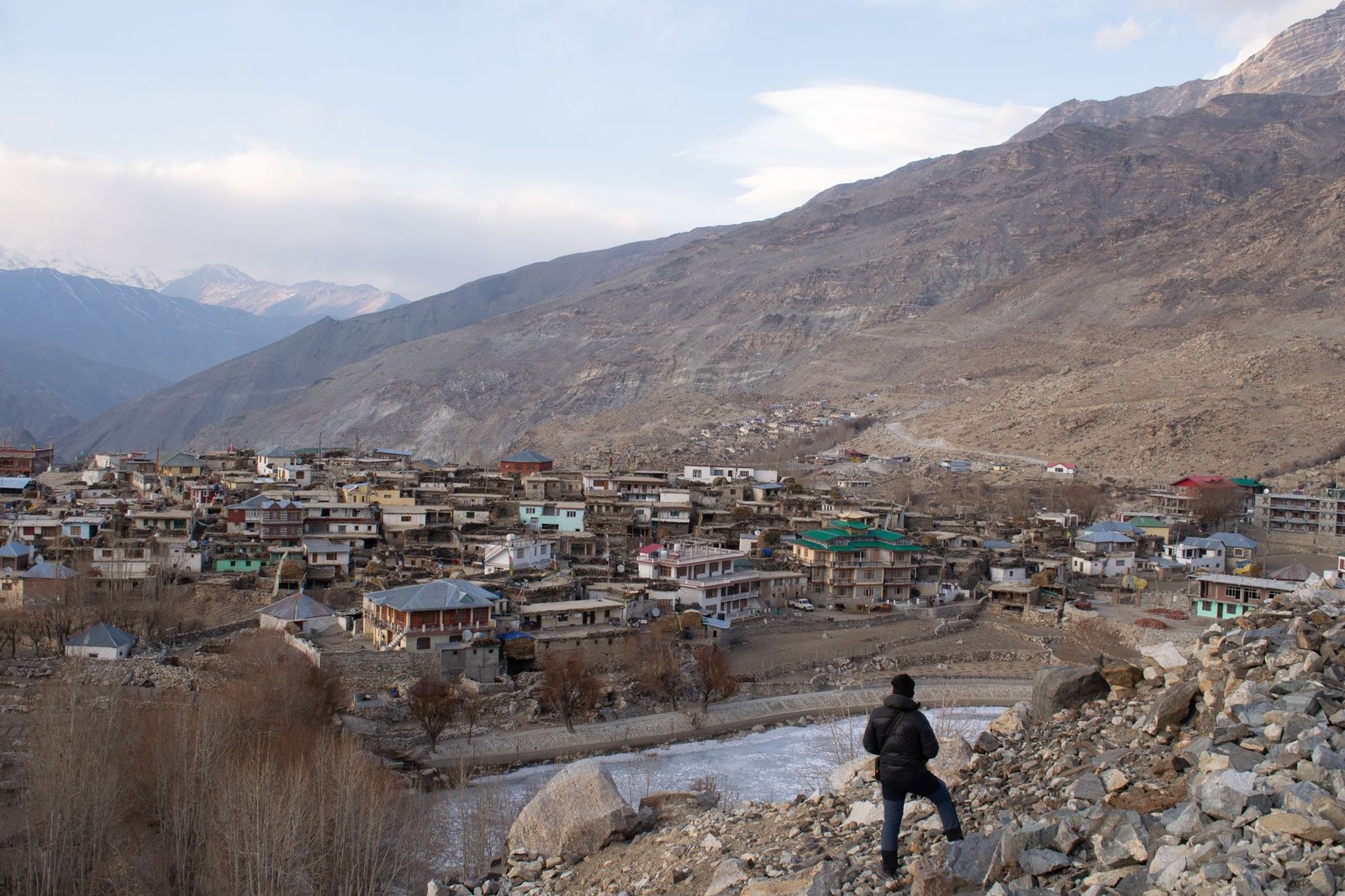 A breathtaking view of Nako village nestled amidst the rugged Himalayan mountains.