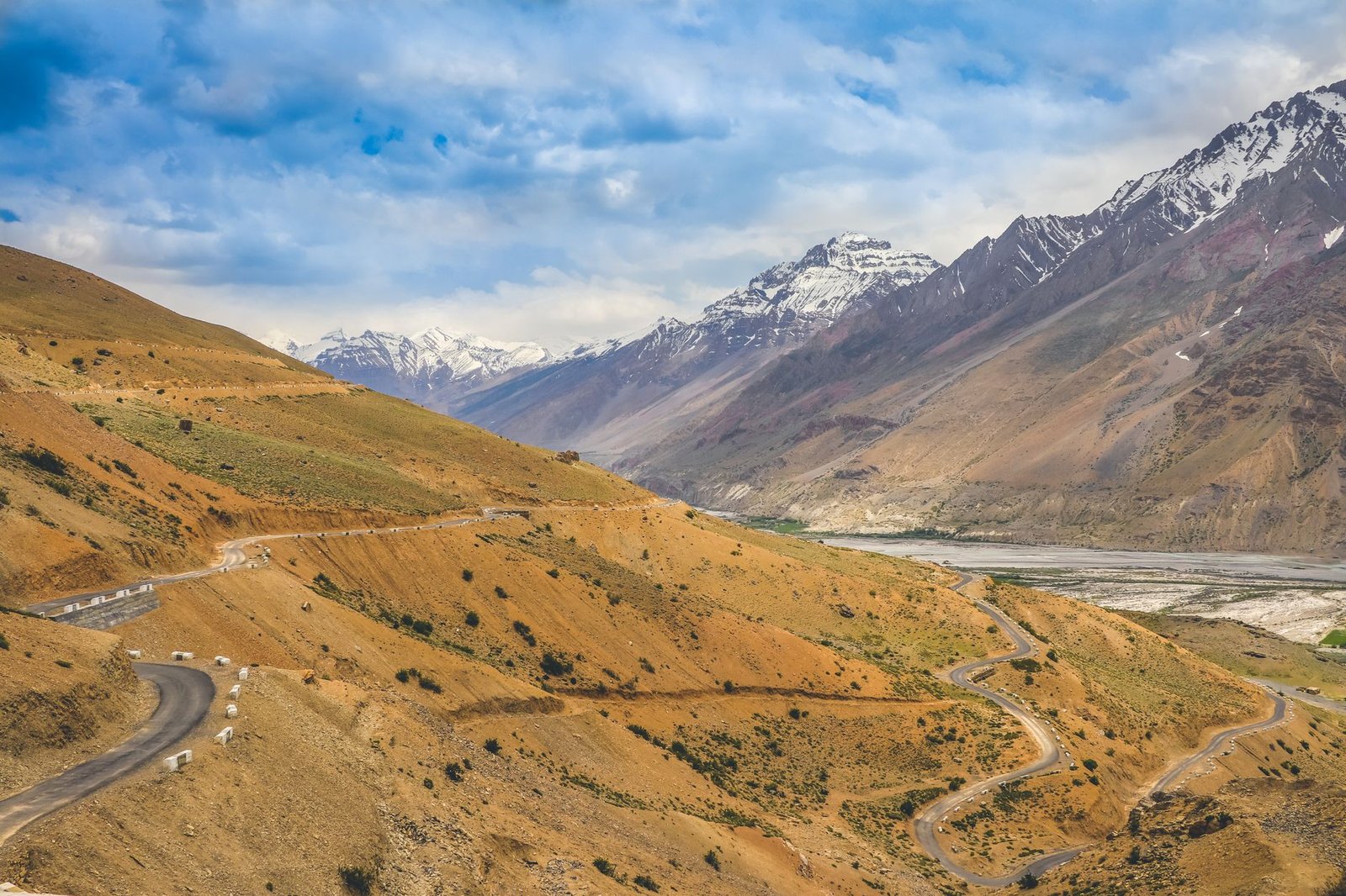 A winding road through the majestic Himalayan landscape near Komic, India.