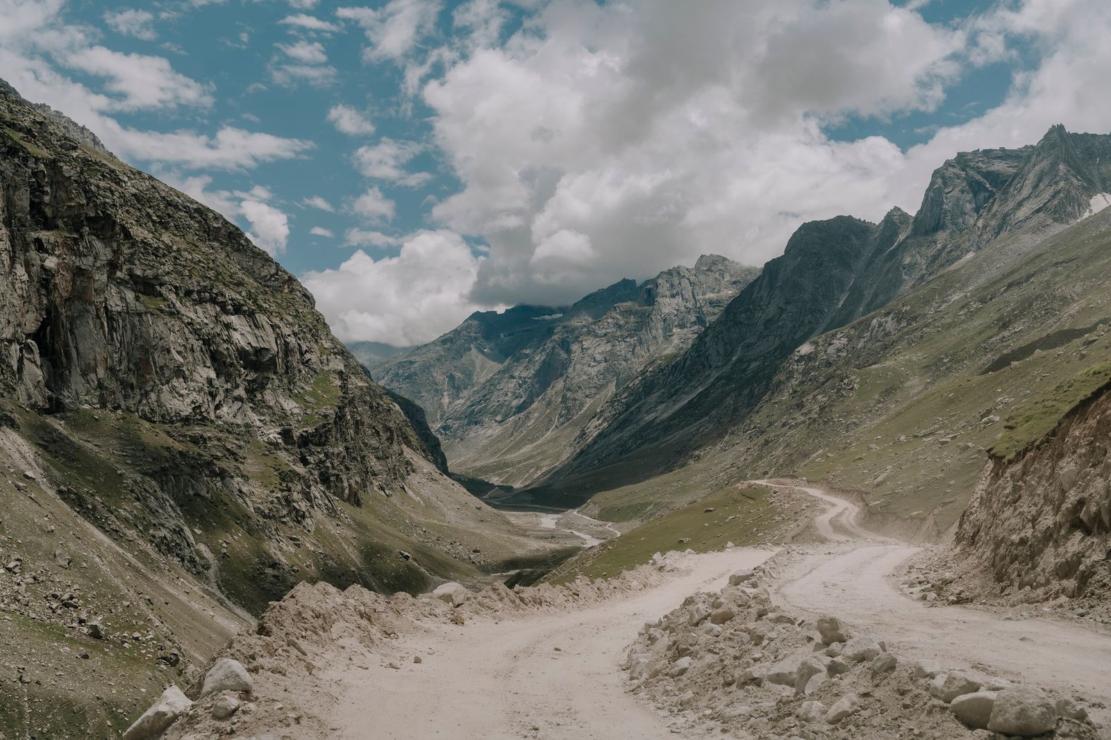 Stunning landscape of rugged mountains in Spiti Valley, Himachal Pradesh, captured with a picturesque sky.