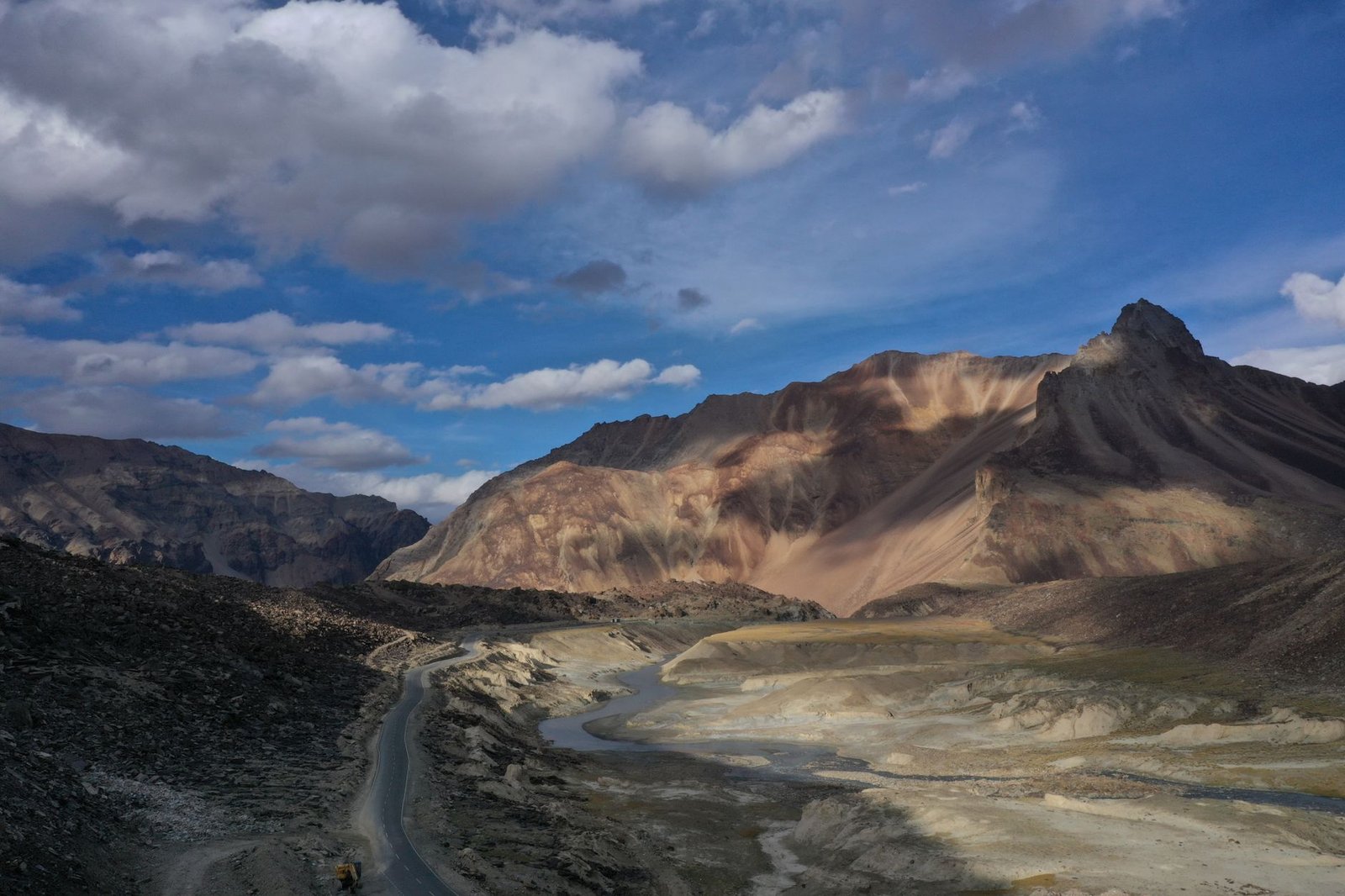 Breathtaking view of rugged mountains and river in Kangra Valley, Himachal Pradesh.