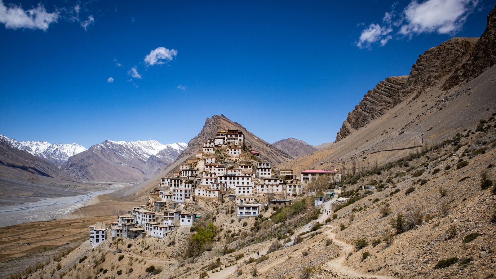 Majestic Key Monastery nestled in the rugged Himalayas, clear blue sky