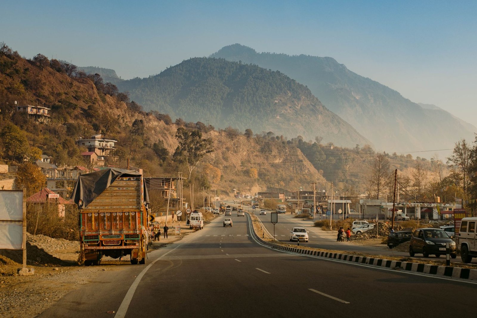 Picturesque road through hills in Kasol, Himachal Pradesh, India.